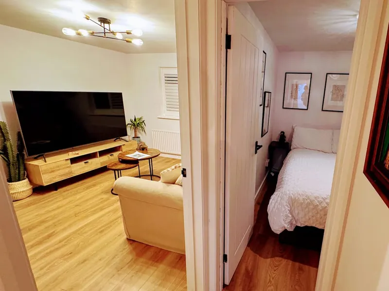 Living area with a view through to the bedroom